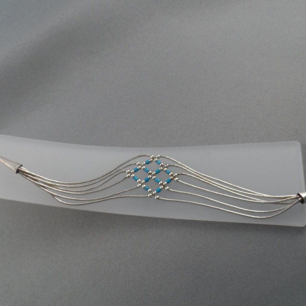 Vintage Turquoise Navajo Hand Made Bracelet with Liquid Silver 6 Strands 7"
